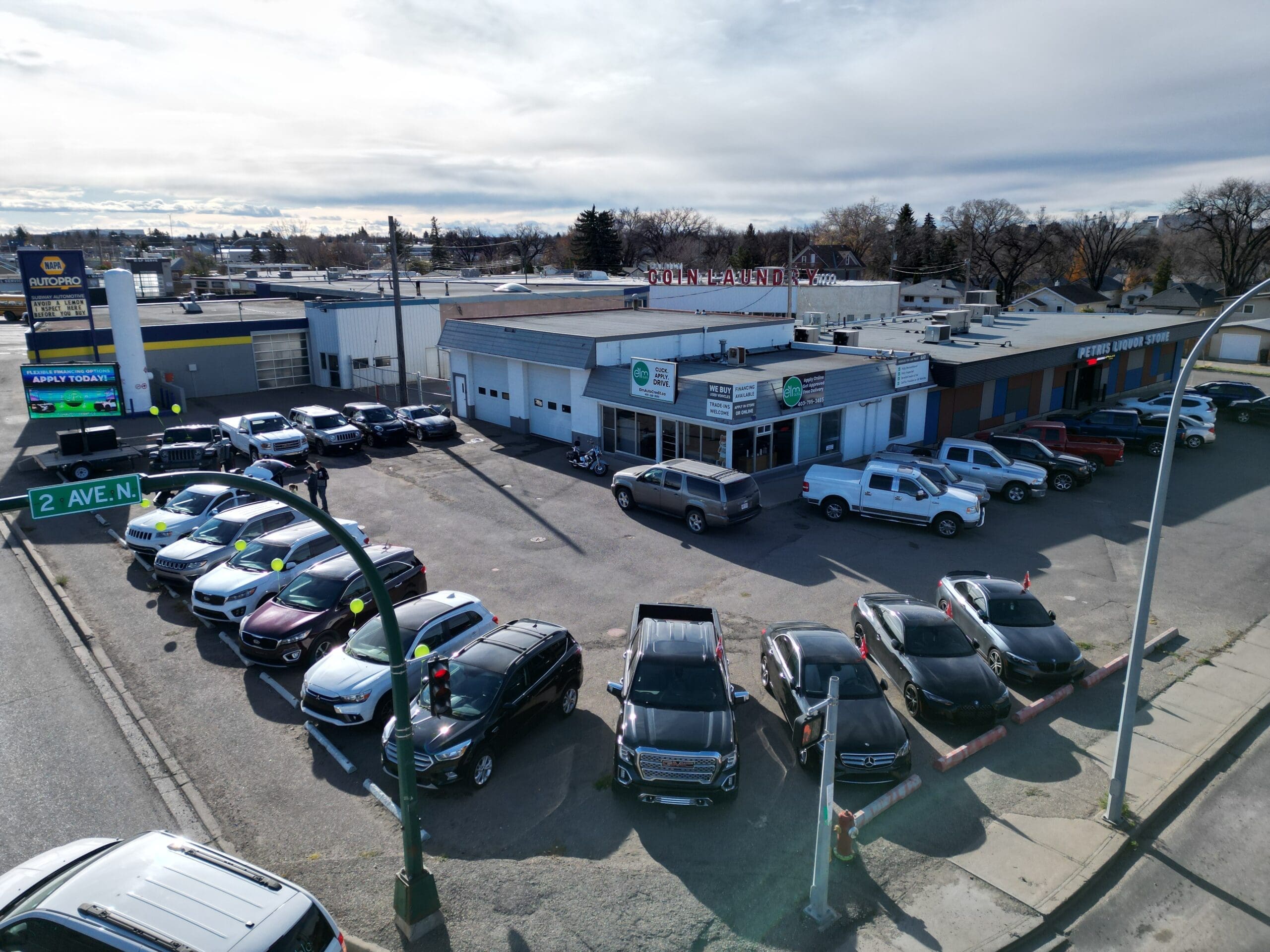 The front entrance and signage for ELM Auto in Lethbridge.